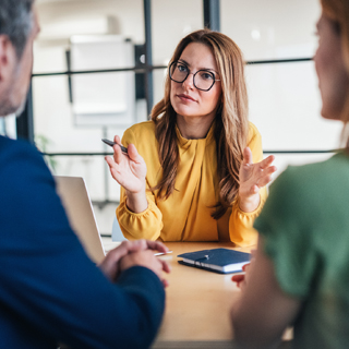 couple meeting with lawyer or financial advisor