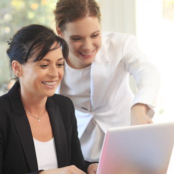 A Patelco Home Loan Consultant helps a member with her home equity loan