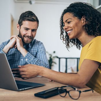 People in a meeting on laptop