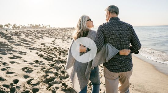 Couple walking on beach