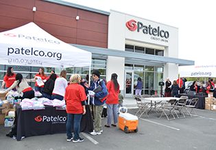 Patelco team members supporting community members in front of the Santa Rosa branch photo
