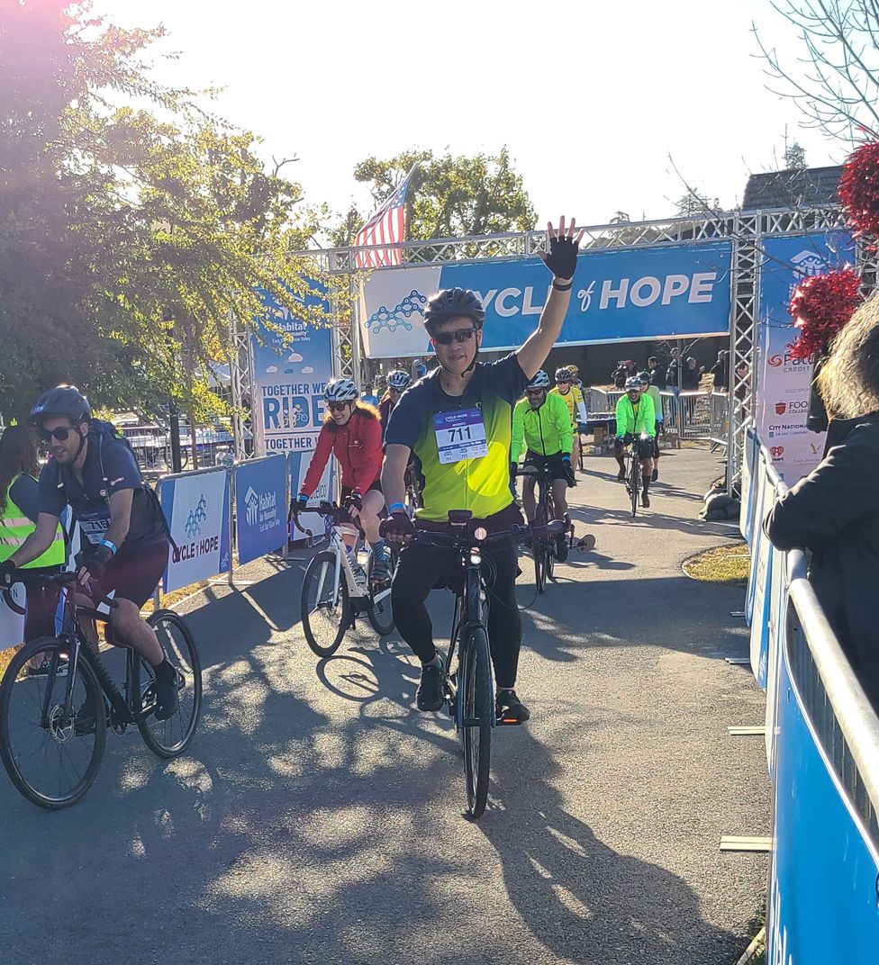 A cheerful rider and the Cycle of Hope finish line