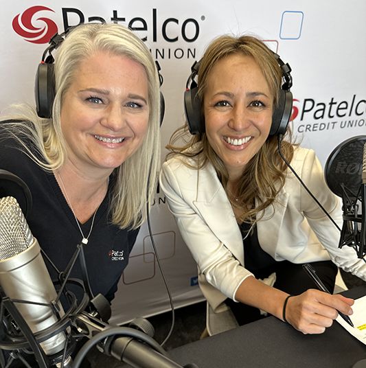 Patelco employees Michele Enriquez and Jennifer Mink at the podcast desk