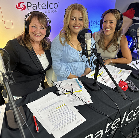 Patelco employees Michele Enriquez, Peggy Wyman, and Shaida Samimi at the podcast desk.