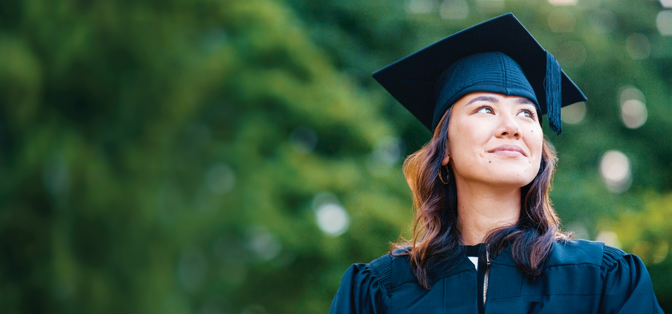 Student outside of their graduation ceremony
